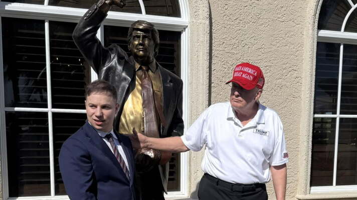 Anthony Constantino and President Donald Trump infront of a bronze statue commissioned by Constantino