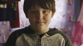 Curtis is the young boy at the center of "Inheritance." (Courtesy)