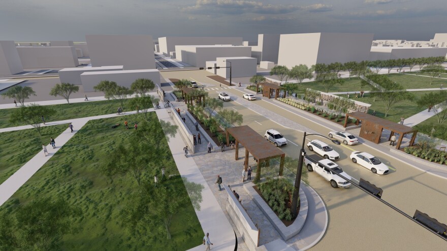 A rendering showing 6th Street at I-35 with caps over the lowered mainlanes of the highway. The interstate itself is not visible. We just see a cross street with greenspace on either side of 6th Street. Distant buildings are nondescript white boxes in this illustration.