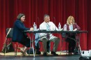 From left, Merced County Office of Education superintendent candidates Ana Boyenga, Richard Lopez and Paula Heupel take notes after a question is read aloud at the forum run by the Merced County School Board Association.