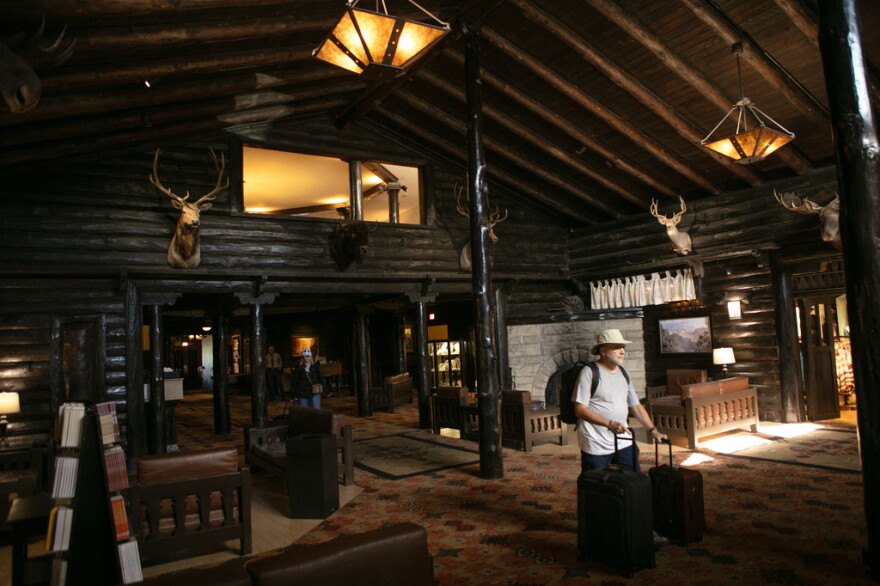 Tourists check out of the El Tovar Hotel as lodging along the rim of the canyon was shut down due to flooding, Monday, Aug. 31, 2026 at Grand Canyon National Park, Ariz.