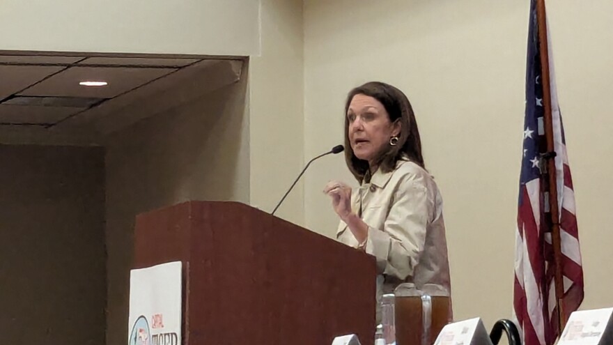 School Board Member Alva Smith speaking before the Capital Tiger Bay Club March 16.