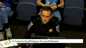 Sparks Chief of Police Chris Crawforth, in uniform, speaking at the council meeting