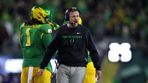 Oregon head coach Dan Lanning calls to his team during the first half of the first round of the NCAA College Football Playoff against James Madison, Saturday, Dec. 20, 2025, in Eugene, Ore.