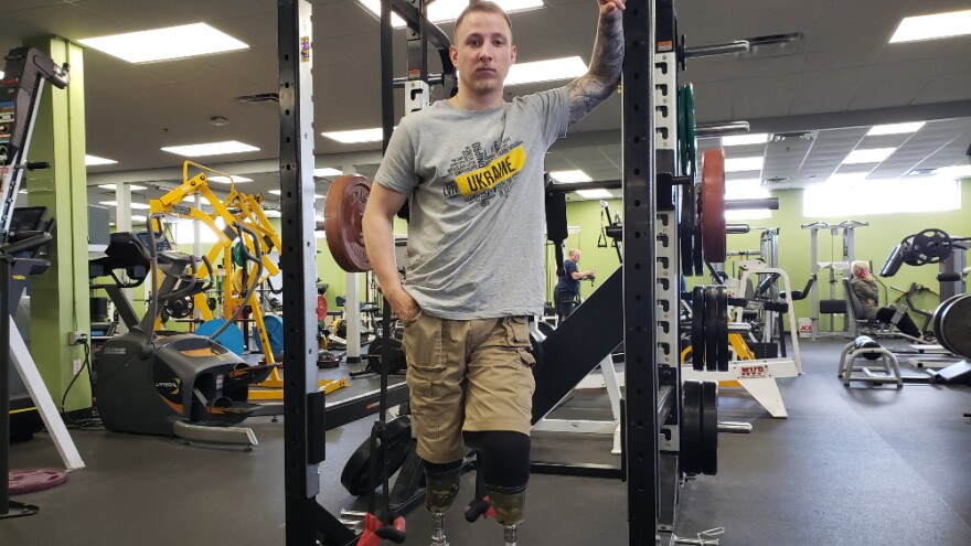   Alexander Bugko, 26 of Ukraine. Bugko was a coffee shop barista studying to be a graphic designer prior to Russia's invasion of Kyiv. He was eating dinner in a trench when an explosion buried him under mounds of dirt and took away his legs. Bugko stands in the Prosthetic Orthotic Associates center, south of downtown Orlando, working out and practicing how to walk with his prosthetic legs donated to him by the Revived Soldiers Ukraine 501 C3 charity.