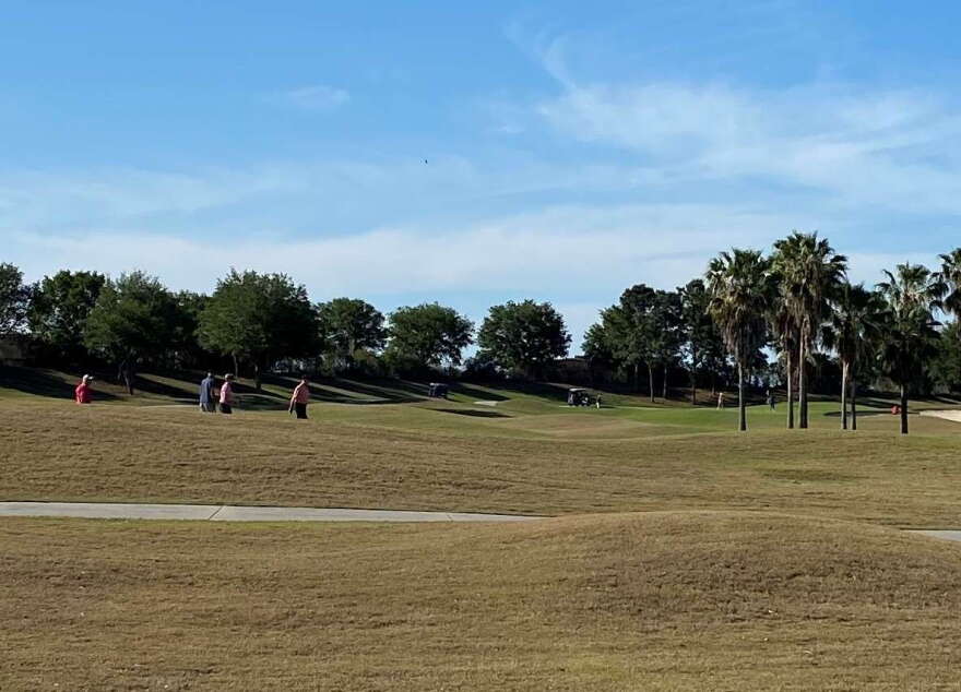 People continue to play golf in The Villages. Photo: Joe Byrnes