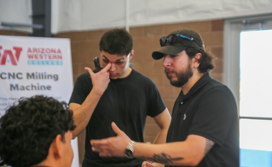 Jose Martinez (right), was one of many students in attendance. He shared he's most excited to try out the CNC milling machine. That machine is used for carving precision.
