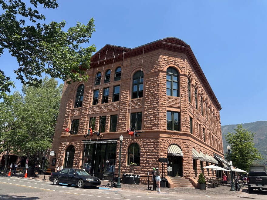 BANDALOOP artists rehearse outside the Wheeler Opera House on Thursday, July 2.