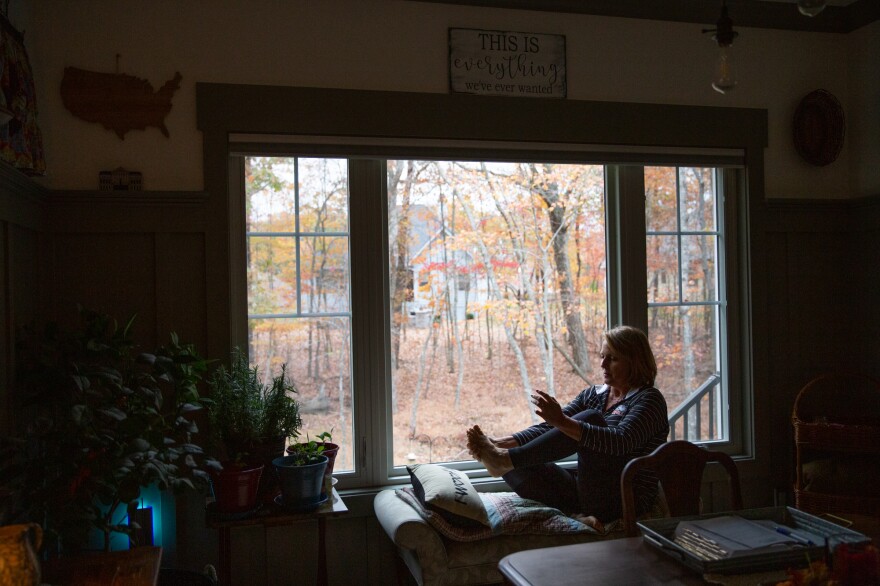 Bobb massages her feet with sweet-smelling lavender oil — another part of her morning routine. Successfully mitigating long-term pain, she finds, takes all of the tools in the toolkit.