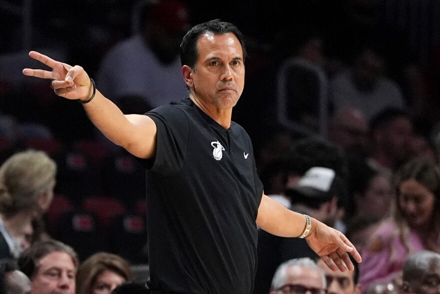 Miami Heat head coach Erik Spoelstra gestures from courtside