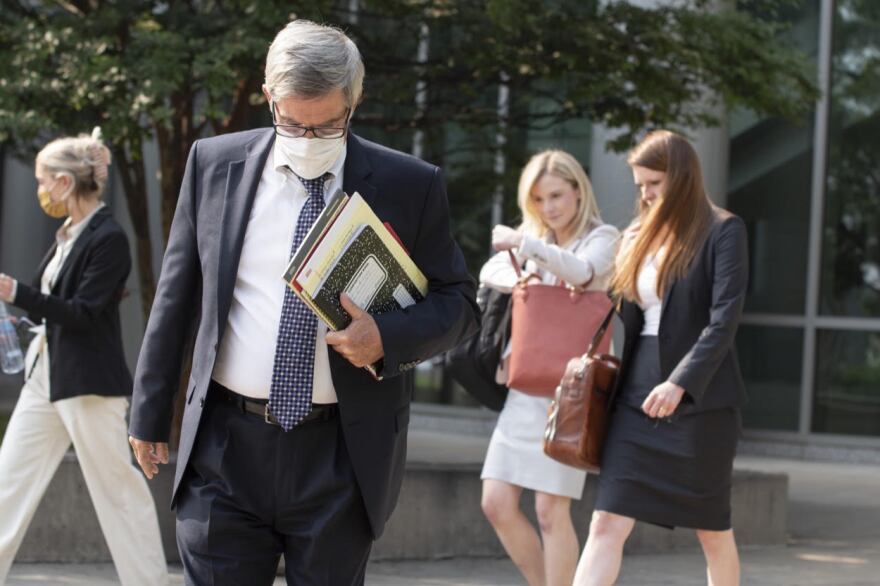 Defendant Gilbert Baker exits the U.S. courthouse on Friday afternoon.