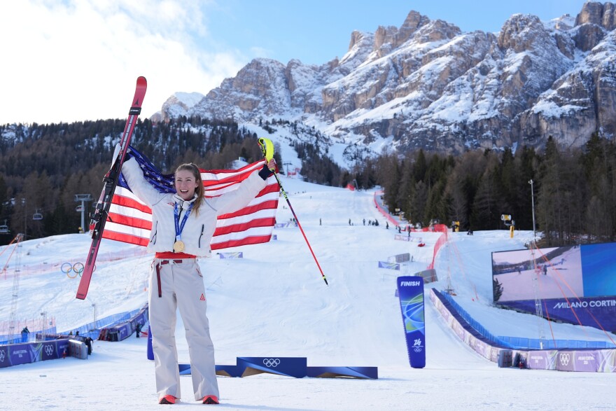 United States' Mikaela Shiffrin celebrates winning the gold medal in an alpine ski, women's slalom race, at the 2026 Winter Olympics, in Cortina d'Ampezzo, Italy, Wednesday, Feb. 18, 2026.