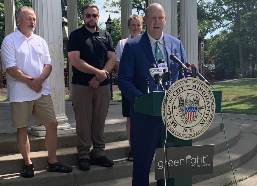 Greenlight Networks CEO Mark Murphy announced the company's Binghamton expansion in Recreation Park on Wednesday. (Jillian Forstadt/WSKG)