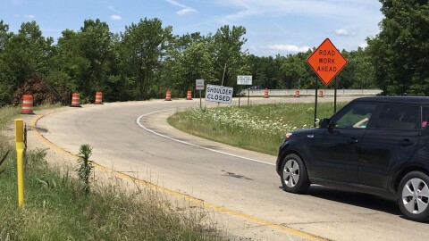 A motorist prepares to enter a construction area.