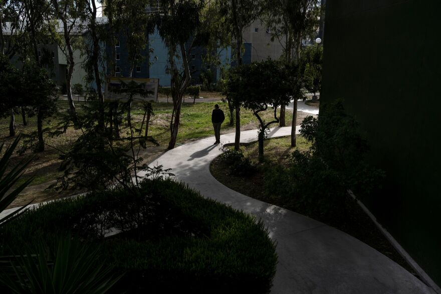 A male student walks in the Otay Campus at the Universidad Autonoma de Baja California in Tijuana. Offices, classes, streets and transit were emptier than usual.