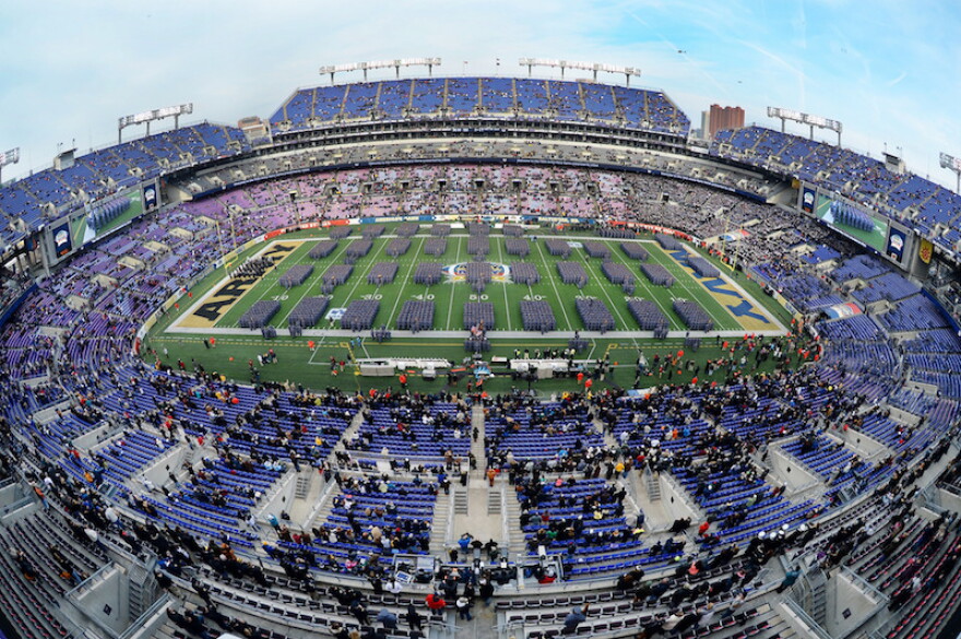 U.S. Military Academy cadets march onto M&T Stadium in Baltimore, Md. before the 115th Army-Navy football game Dec. 13, 2014.