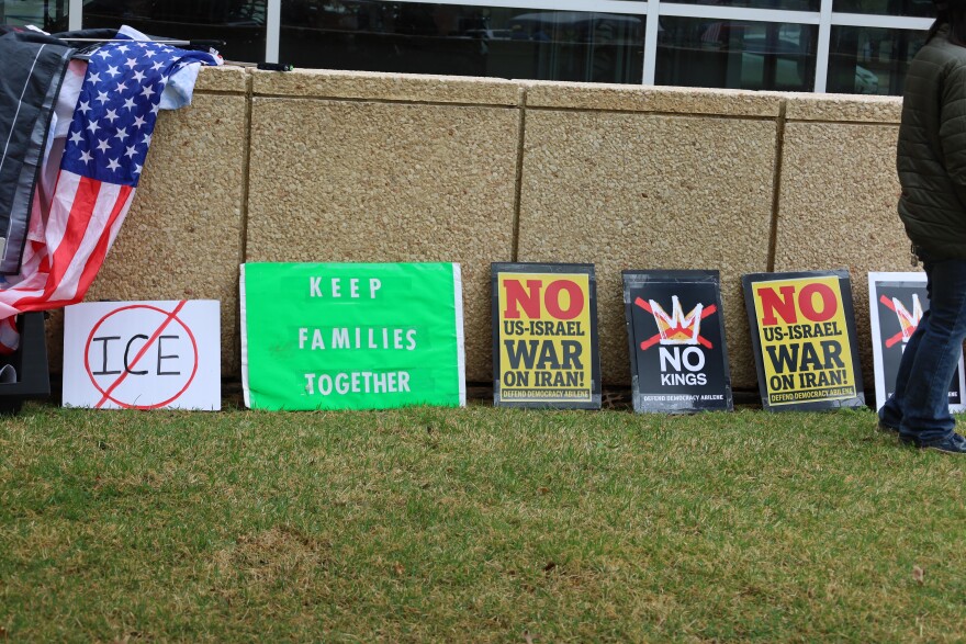 Protestors at the No Kings rally held up signs against the war in Iran and ICE. (Photo by Baylie Simon)