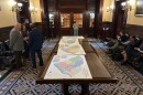 Maps for new congressional districts in South Carolina are shown in the South Carolina Senate antechamber on Friday, May 22, 2026, in Columbia, S.C. (AP Photo/Jeffrey Collins)