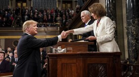 President Trump shakes hands with House Speaker Nancy Pelosi as Vice President Pence looks on in the House chamber before giving his State of the Union address to a joint session of Congress on Feb. 5, 2019.