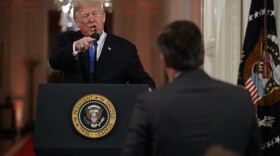 President Donald Trump speaks to CNN journalist Jim Acosta during a news conference in the East Room of the White House, Wednesday, Nov. 7, 2018, in Washington.