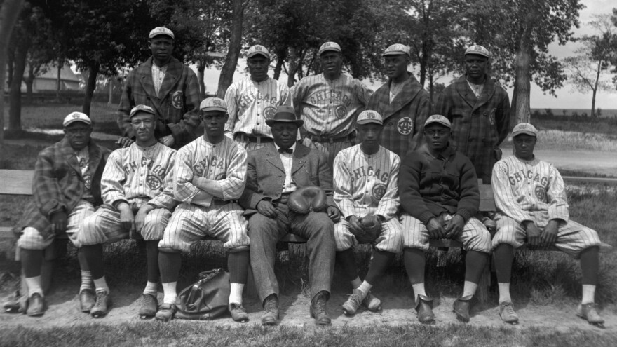 Members of the Chicago American Giants pose for a team portrait in 1914 in Chicago. (L to R) (Front row) Billy "Little Corporal" Francis, Richard "Dick" Whitworth, Joseph Preston "Pete" Hill, Andrew "Rube" Foster, Bruce Petway, James "Pete" Booker, unidentified. (Back row) Bill Gatewood, Jesse Barber (aka Barbour), Leroy Grant, John Henry "Pop" Lloyd, Robert "Jude" Gans.