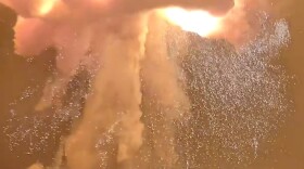 A rocket explodes during an engine-firing test 