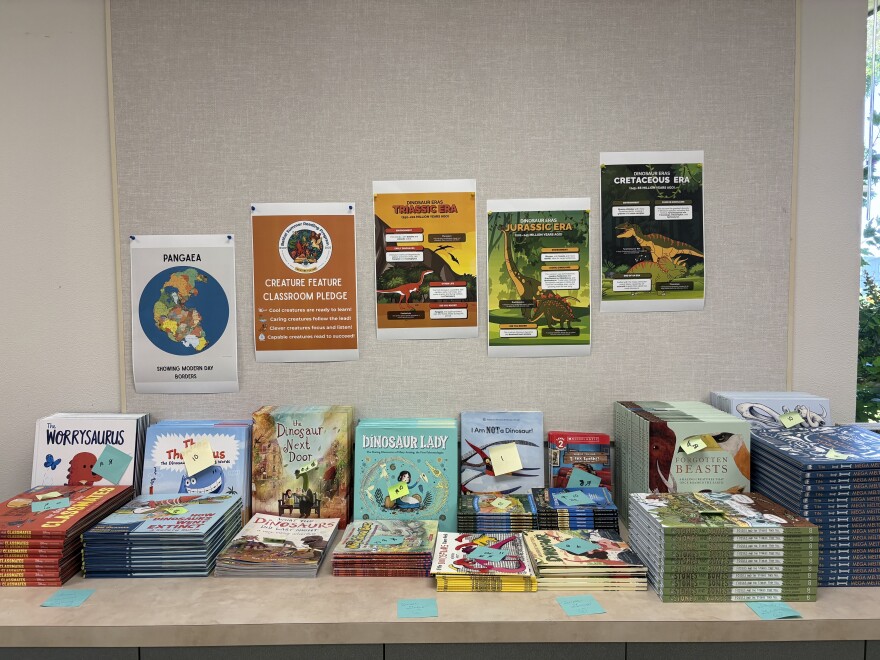 The theme for the program’s lessons this year is prehistoric, extraordinary and mythical creatures. The program’s literacy coaches choose themes that help students learn about science, geography, and other disciplines as they read.