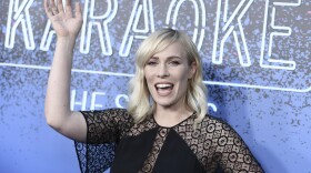 Natasha Bedingfield, in a black dress, waves from the red carpet for Carpool Karaoke: The Series launch event at the Chateau Marmont Hotel on Monday, Aug. 7, 2017, in Los Angeles. 