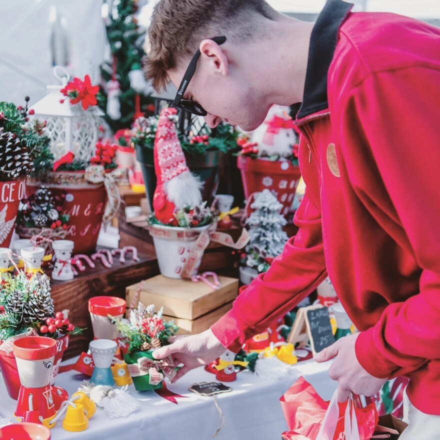 A shopper at Merry Market at City Market
