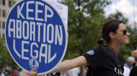 An abortion-rights demonstrator holds a sign during a rally Chattanooga, Tennessee. (Ben Margot/AP)