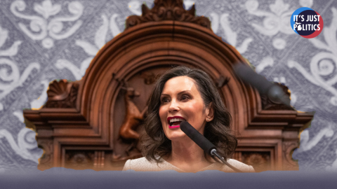 Governor Gretchen Whitmer stands in front of a partially duotone background. The It's Just Politics logo is in the top right corner.