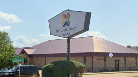 The exterior of a bank. specifically, Credit Union For All's location on Eastland Drive in Bloomington.