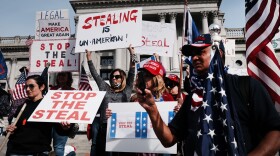 Dozens of people calling for stopping the vote count in Pennsylvania due to alleged fraud against former President Donald Trump gather on the steps of the State Capital on November 05, 2020 in Harrisburg, Pennsylvania. (Spencer Platt/Getty Images)