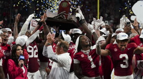 Alabama celebrates after a win against Georgia after the Southeastern Conference championship NCAA college football game in Atlanta, Saturday, Dec. 2, 2023. (AP Photo/John Bazemore)