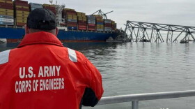 U.S. Army Corps of Engineers staff observe the wreckage of the Francis Scott Key Bridge in Baltimore. March 26, 2024. Department of Defense.