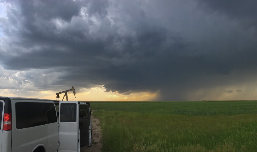 Penn State meteorologists prepare to place their instruments in the path of a storm.