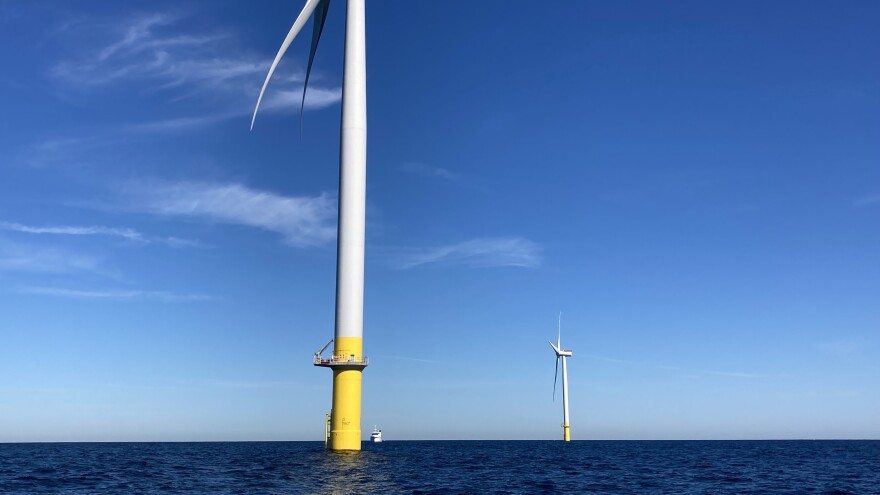 Dominion Energy’s two pilot wind turbines off Virginia Beach in 2021. (Photo by Katherine Hafner)