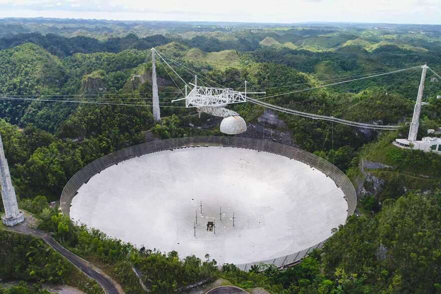 Operations at the UCF-managed Arecibo Observatory (pictured here in the spring of 2019) are stopped until repairs can be made from an incident in August that caused a 100-foot-long gash on the telescope’s reflector dish. Photo: UCF