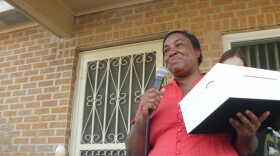 Molly Butler thanks St. Bernard Project volunteers for rebuilding the home she lost after Hurricane Katrina.