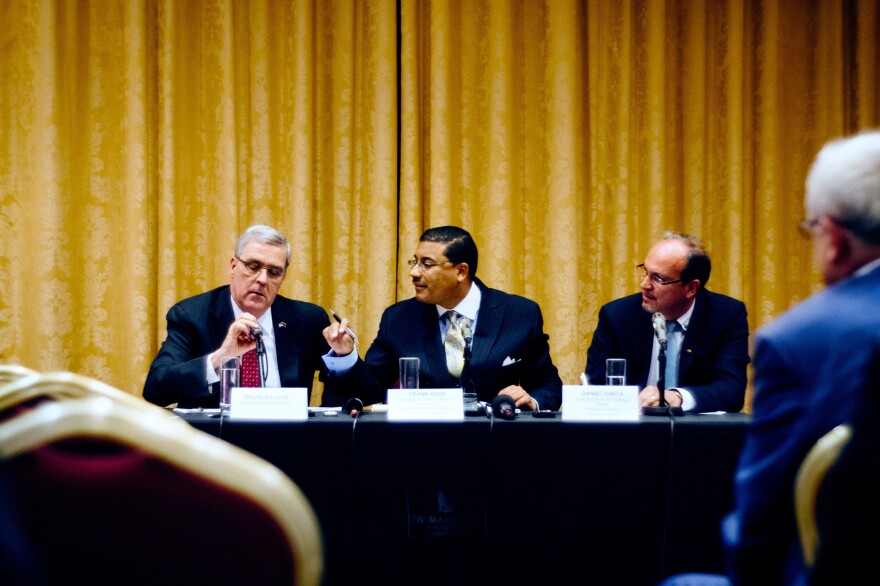 U.S. Ambassador to NATO Douglas Lute (left); Assistant Secretary of State for Arms Control, Verification and Compliance at the U.S. State Department Frank Rose (center); and the state secretary for strategic affairs in Romania's Foreign Ministry, Daniel Ionita, give a briefing on NATO's ballistic missile defense this month in Romania.