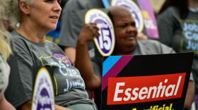 SEIU union members rally outside their hall in Merrillville to advocate for a $15 an hour minimum wage in Indiana.