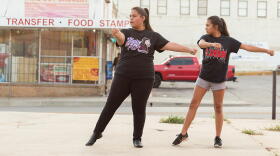 Two dancers practice in an empty lot next to their International Dance Studio (IDance) in Capitol Hill.