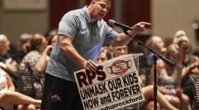 Craig Ladyman, of Rockford, speaks during the Kent County board meeting at DeVos Place in Grand Rapids, Mich., on Thursday, Aug. 26, 2021. The meeting was held after the Kent County Health Department issued a mask mandate for teachers and children preschool through sixth grade across the county