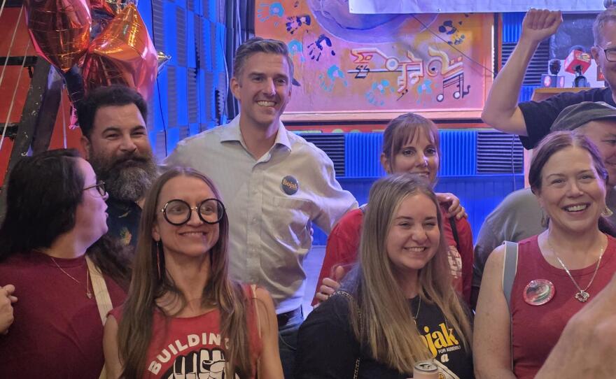 Adam Bojak (middle) celebrates with supporters at his primary night viewing party on Buffalo's West Side following his victory in the 149th Assembly District Democratic primary.
