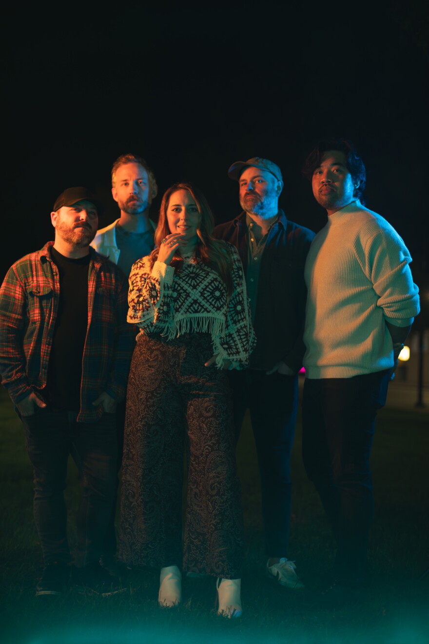 a group of people posing 