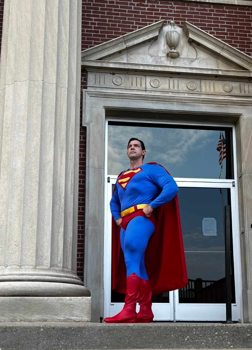 Joshua Boultinghouse poses in his Superman suit, a job he takes on for the city of Metropolis, Illinois. He makes appearances takes photos at the Superman Celebration.