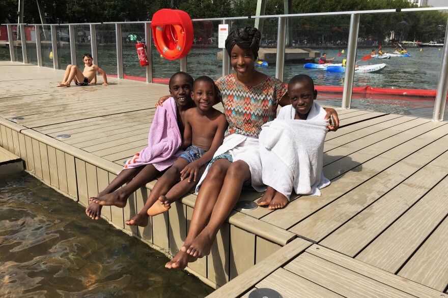 Kgani Drame, a French teacher and native Parisian, brought her three young cousins to the canal pool to escape the heat. "It's like you're not in Paris when you're here. You are at the seashore."