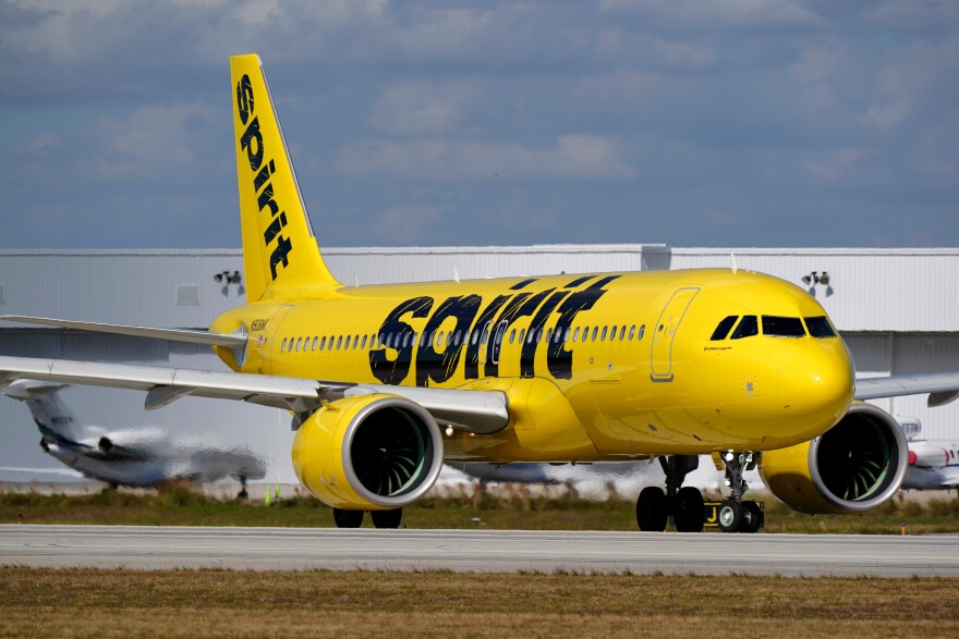 FILE - A Spirit Airlines Airbus A320 prepares to take off from Fort Lauderdale-Hollywood International Airport, Jan. 19, 2021, in Fort Lauderdale, Fla.