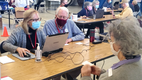 Libraries across Indiana are assisting in covid-19 vaccine assistance. Staff have been trained to answer questions and register residents. Staff at thehe Knox County Public Library assist at a local site.