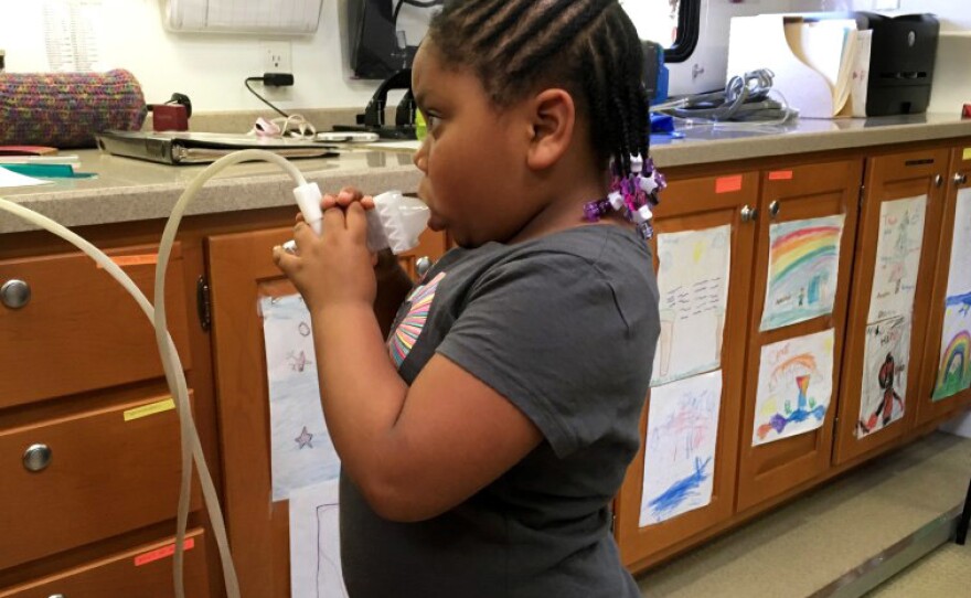 A lung test on the Breathmobile finds that 5-year-old Brooklyn Turner's pulmonary function is compromised by her asthma.